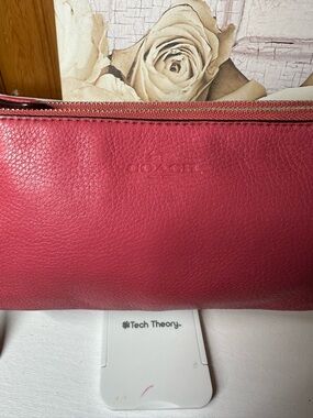 COACH Raspberry Pink Pebbled Leather Zip Clutch